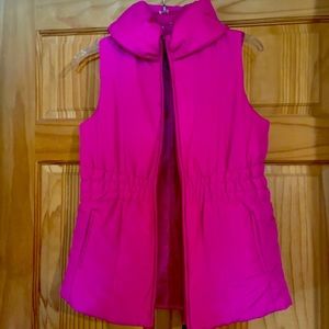 Women’s hot pink vest.